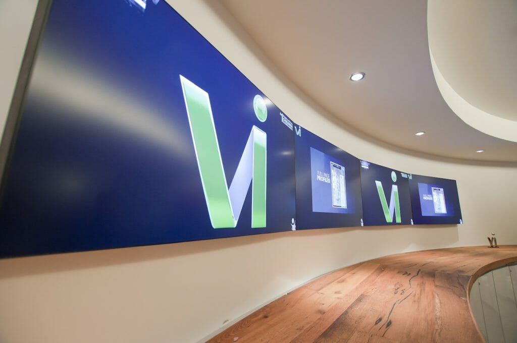 Signage utilization in a heavily designed corporate headquarters to enhance the visitor experience.